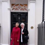 The photo shows Margaret Clark on the right and Angela Haylock on the left (in the red coat).