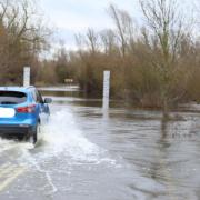 Motorists still defied flood warnings along the A1101 Welney Wash Road.