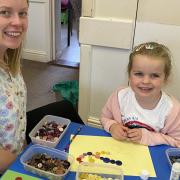 The bead art activity was a hit with children and their parents