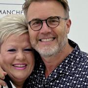 Sue Smith pictured with singer-songwriter Gary Barlow