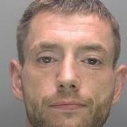 Lawrence King has been jailed for strangling his ex-partner after she refused to buy stolen meat from him.