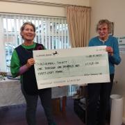 Jane Wicks and Janet Townsin, from Sutton accepted the cheque for £1,148 on behalf of The Alzheimer's Society.