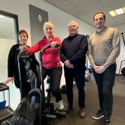 Cllr Julia Huffer (on exercise bike) with Clare Pendle, David Ambrose-Smith and Martin Grey.
