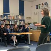 Lucy Frazer MP with students from the Debating Society at Witchford Village College.