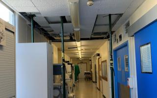 Props holding up the ceiling at the QEH, where staff members noticed concerning movement