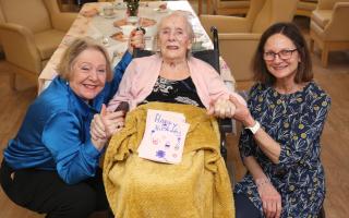 Lily Hale on her 101st birthday with her daughter Sandra Cutter (L) and Lily House manager Kerry Clifton (R).